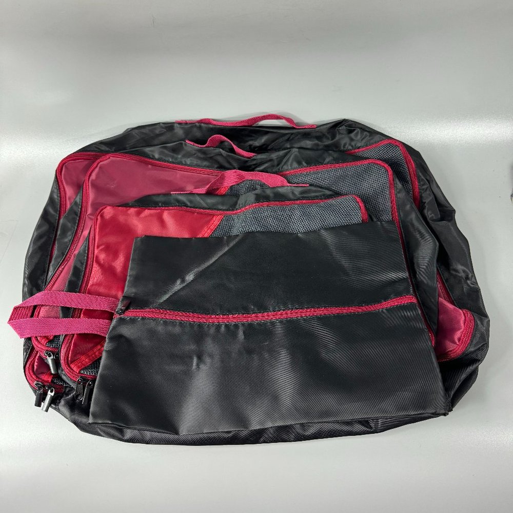 A Set of Four (4) Black/Red Nylon Travel Organizers
